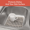 image:imageSpectrum Small Sink Mat Protector for Kitchen Sink with Raised Feet for Quick Drying and Water Flow Soft Rubber Non Slip Surface Protects Dishes Glassware for Stainless Steel Sinks ButtercreamWarm GrayClear