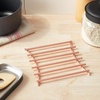 image:imageSpectrum Trivets for Hot Dishes Pots and Pans Heat Resistant Protector for Kitchen Counter Dining Tables Large 8 Inch Euro Square Decorative Metal Trivet Countertop Hot Pot Plate Dish Holder CopperCopper